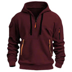 Burgundy hooded sweatshirt with black drawstrings, tan leather-look zip pulls and sleeve zip pocket