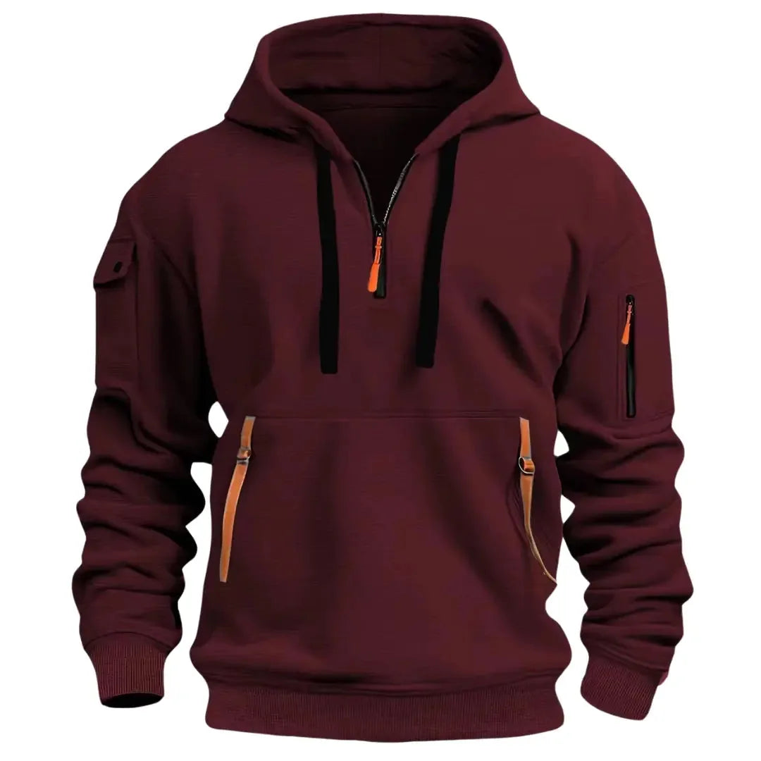 Burgundy hooded sweatshirt with black drawstrings, tan leather-look zip pulls and sleeve zip pocket