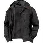 Black hooded workwear jacket with brown collar trim, open front revealing soft grey fleece interior