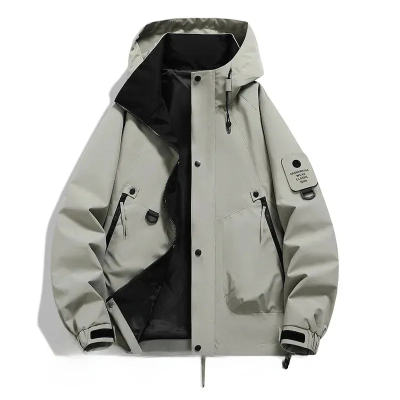 Light grey hooded jacket laid flat, unzipped showing black lining, adjustable cuffs and drawstring hem detail