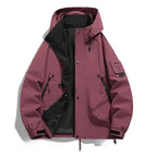 Burgundy red hooded jacket laid flat, unzipped showing black lining, structured hood and elastic cuff straps