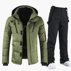 Olive green hooded ski jacket shown with contrasting black bib trousers and adjustable braces