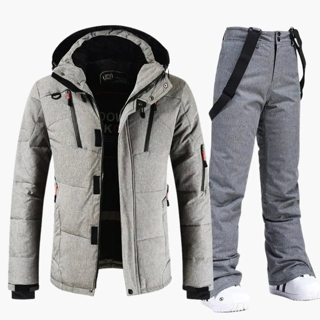 Light grey quilted hooded ski jacket matched with coordinating grey bib trousers