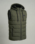 Product shot of an olive green quilted hooded gilet with black faux fur lined hood and drawcord details