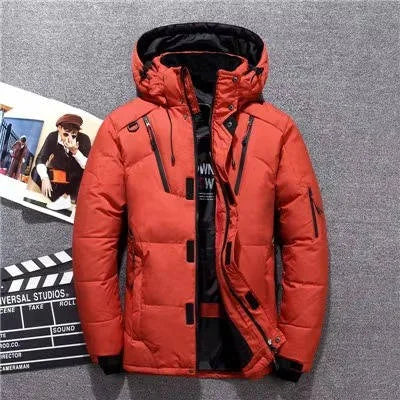 Orange insulated parka laid flat, showing open front zip, inner lining and sleeve pocket with red trim