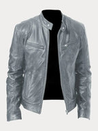Close-up of the zip pocket and press-stud collar on a brown leather biker jacket