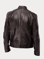 Back view of a dark brown leather biker jacket showing quilted shoulder stitching