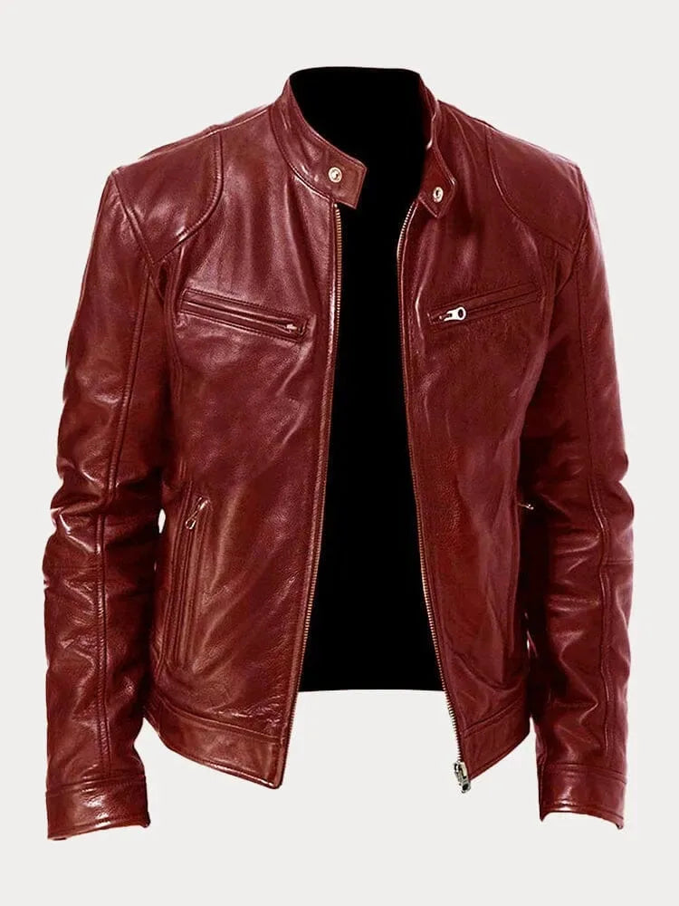 Close-up front view of a black leather jacket showing the snap-button collar and zip chest pocket