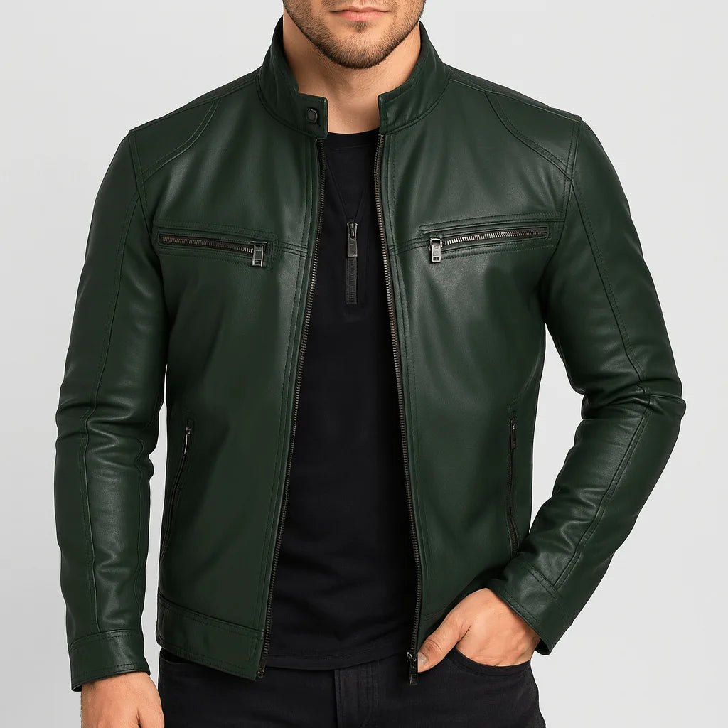 Close-up front view of a dark green leather biker jacket with stand collar and chest zip pockets, worn over a black t-shirt