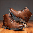 Detail shot of chestnut brown leather boot showing padded collar and brushed metal eyelets
