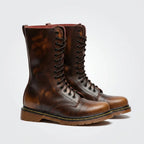 Pair of brown leather combat boots with contrast stitching and black laces, three-quarter view