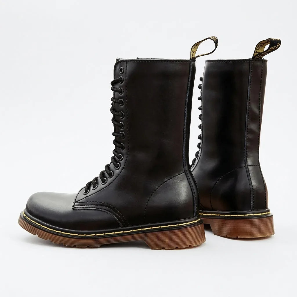 Back and side view of black leather combat boots showing heel pull tab and ridged outsole