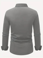 White button-down shirt styled with a black belt and dark trousers for a smart office look