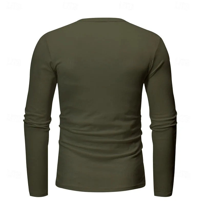 Close-up of the black henley worn by a model, showing the fitted long sleeve and cuff