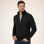 Charcoal grey marl zip-up knitted jumper shown on a model with ribbed cuffs and zippered side pocket