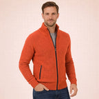 Burnt orange marl zip-front jumper with ribbed stand collar and dark zip pulled halfway up