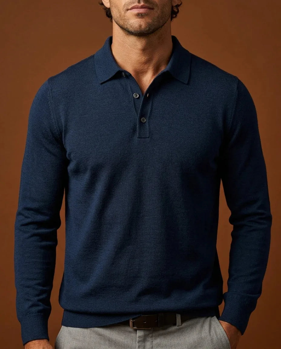 Navy merino wool knitted polo jumper with ribbed collar and two-button placket, worn with grey trousers