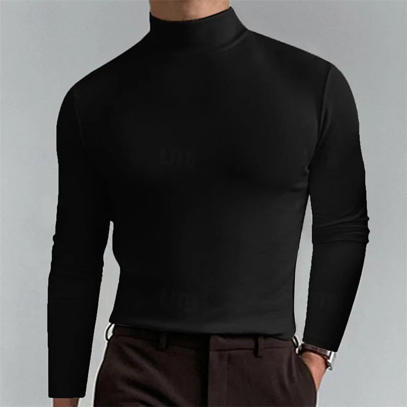 Close front view of a black mock-neck top highlighting the ribbed high collar and body-hugging fit