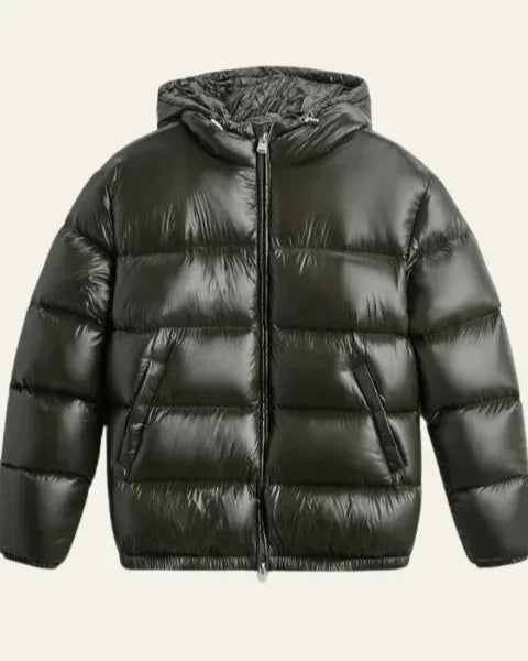 Full front view of the black puffer jacket laid flat showing the central zip and hood