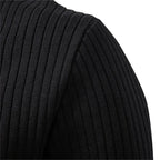 Close-up of the three-button henley placket with matte buttons on a black knit jumper