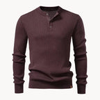 Flat view of a dark brown ribbed knit henley jumper with three-button collar and leather hem tab
