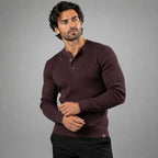 Close-up front view of a black ribbed henley jumper highlighting the button placket detail