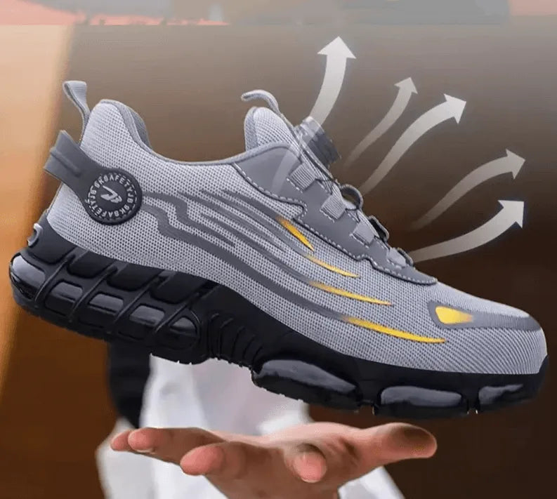 Grey trainer shown mid-air with arrows illustrating the breathable mesh upper and airflow design