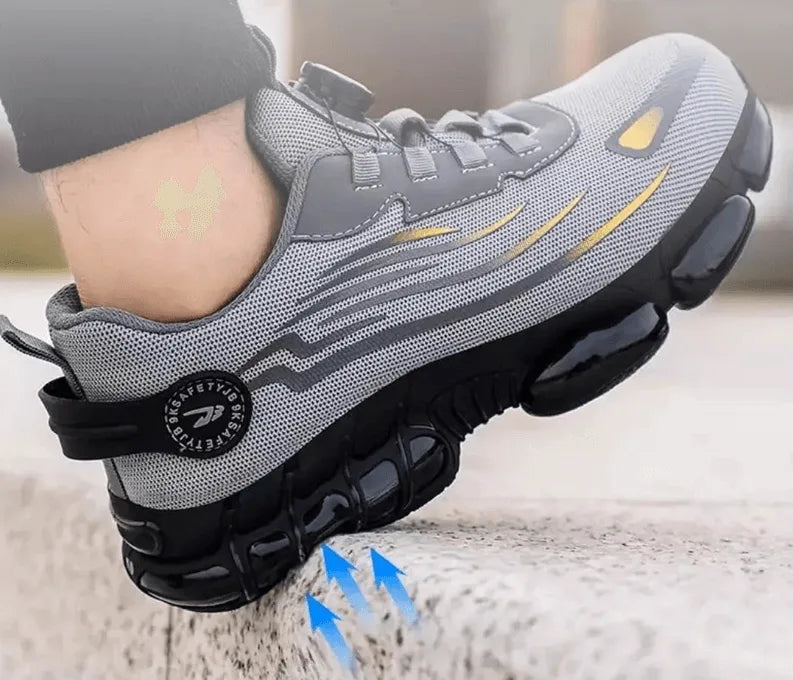 Close-up of a grey trainer's heel and ridged sole against a stone ledge with upward motion arrows