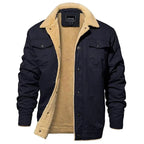 Navy blue sherpa-lined jacket laid flat and open, showing chest flap pockets and fleece interior
