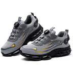 Pair of trainers shown together, one on its side, displaying matching dial closures and sole cushioning
