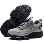 Underside view of the sole revealing the deep tread pattern and textured grip zones