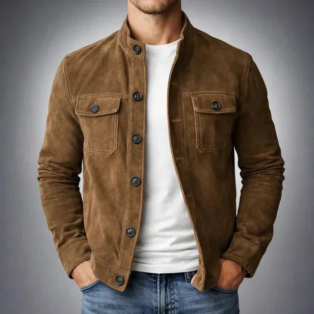 Front view of a tan suede jacket with button-up placket and dual chest pockets, worn with a white tee
