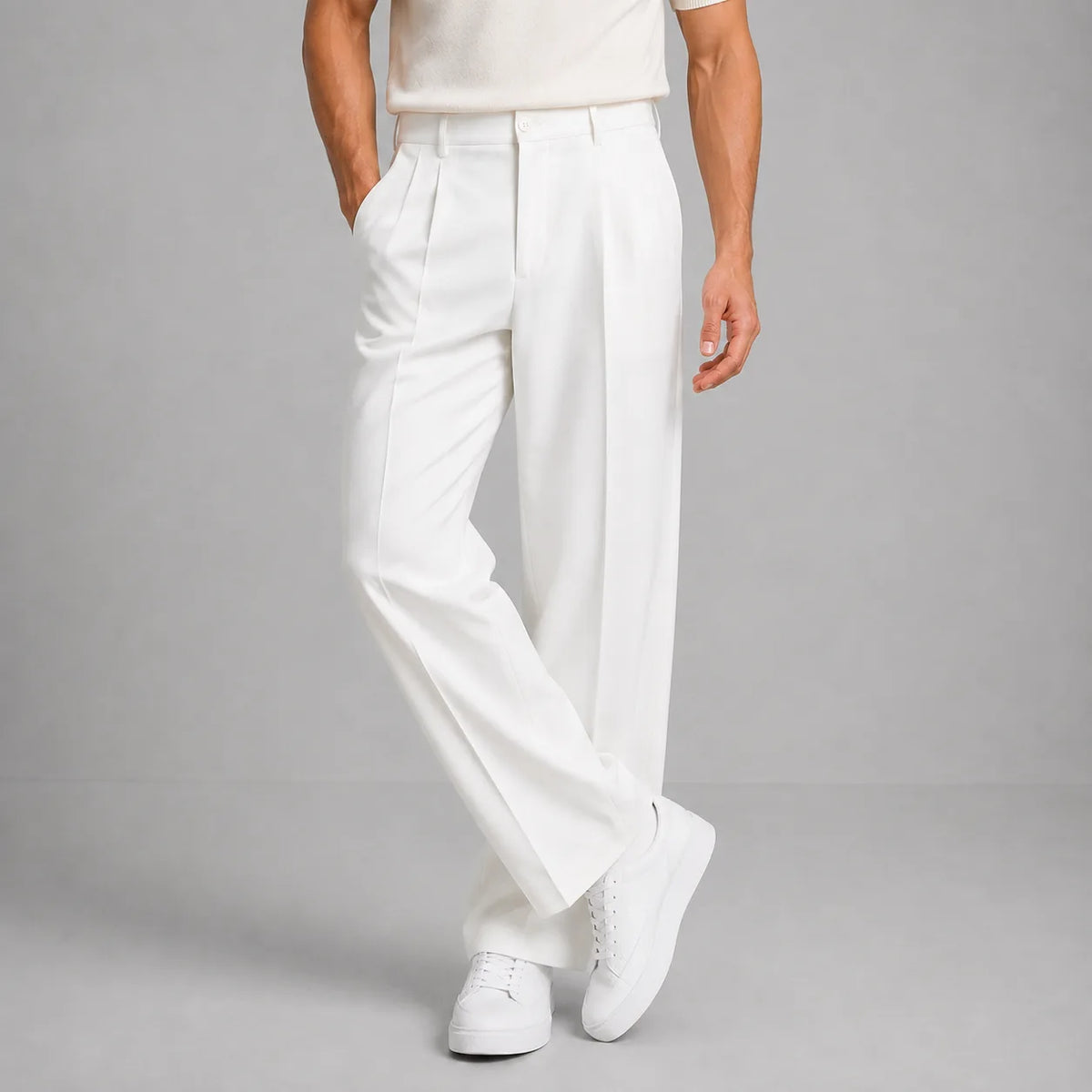Front view of white tailored trousers with front pleat and wide straight leg