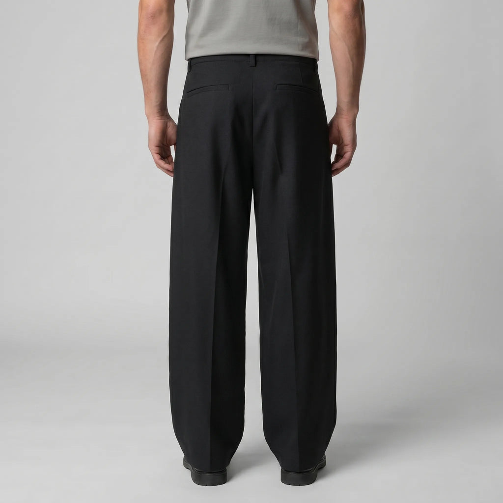 Detail shot of the belt loops and button fastening at the waistband