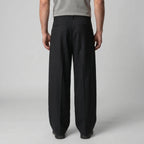 Detail shot of the belt loops and button fastening at the waistband