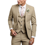 Tan beige three-piece suit with notch lapel jacket, buttoned waistcoat and floral tie