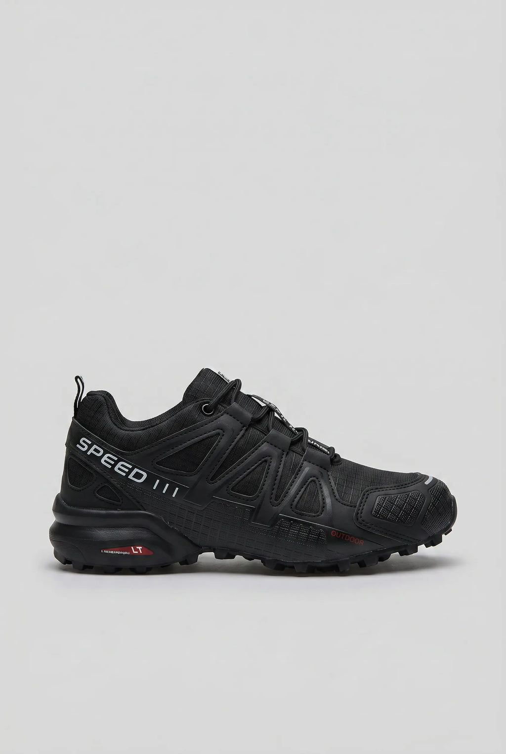 Side profile of an all-black trainer with tonal ripstop texture and subtle grey Speed branding