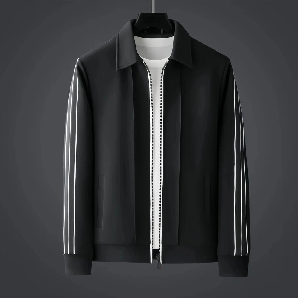 Front view of a black collared zip-up track jacket layered over a white t-shirt with white side stripes