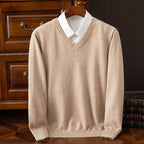 Beige V-neck jumper with white shirt underneath, front view highlighting the knit texture