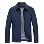 Navy blue jacket with classic point collar, front zip and welt pockets, shown open against a plain background