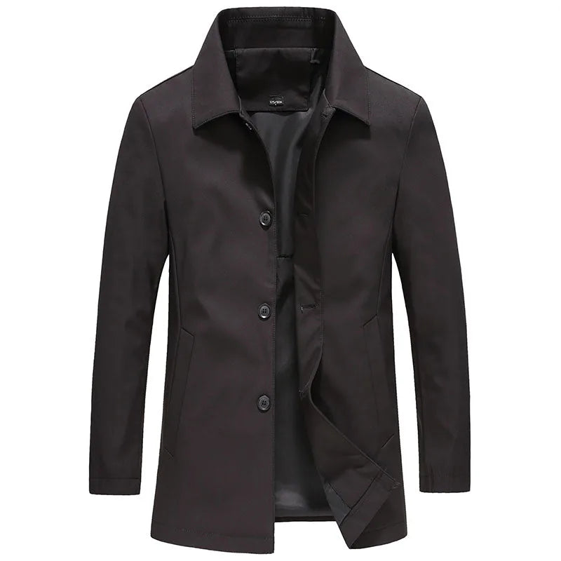 Black longline windproof jacket shown open, buttoned front, pointed collar and dark lining visible