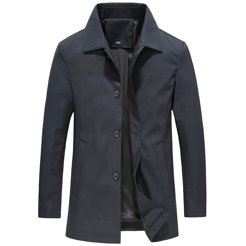 Charcoal grey longline windproof jacket, unbuttoned at the collar, front view on a plain background