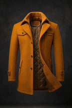 Front view of a mustard brown wool overcoat, unzipped collar, quilted lining visible, buttoned flap pockets and cuffs
