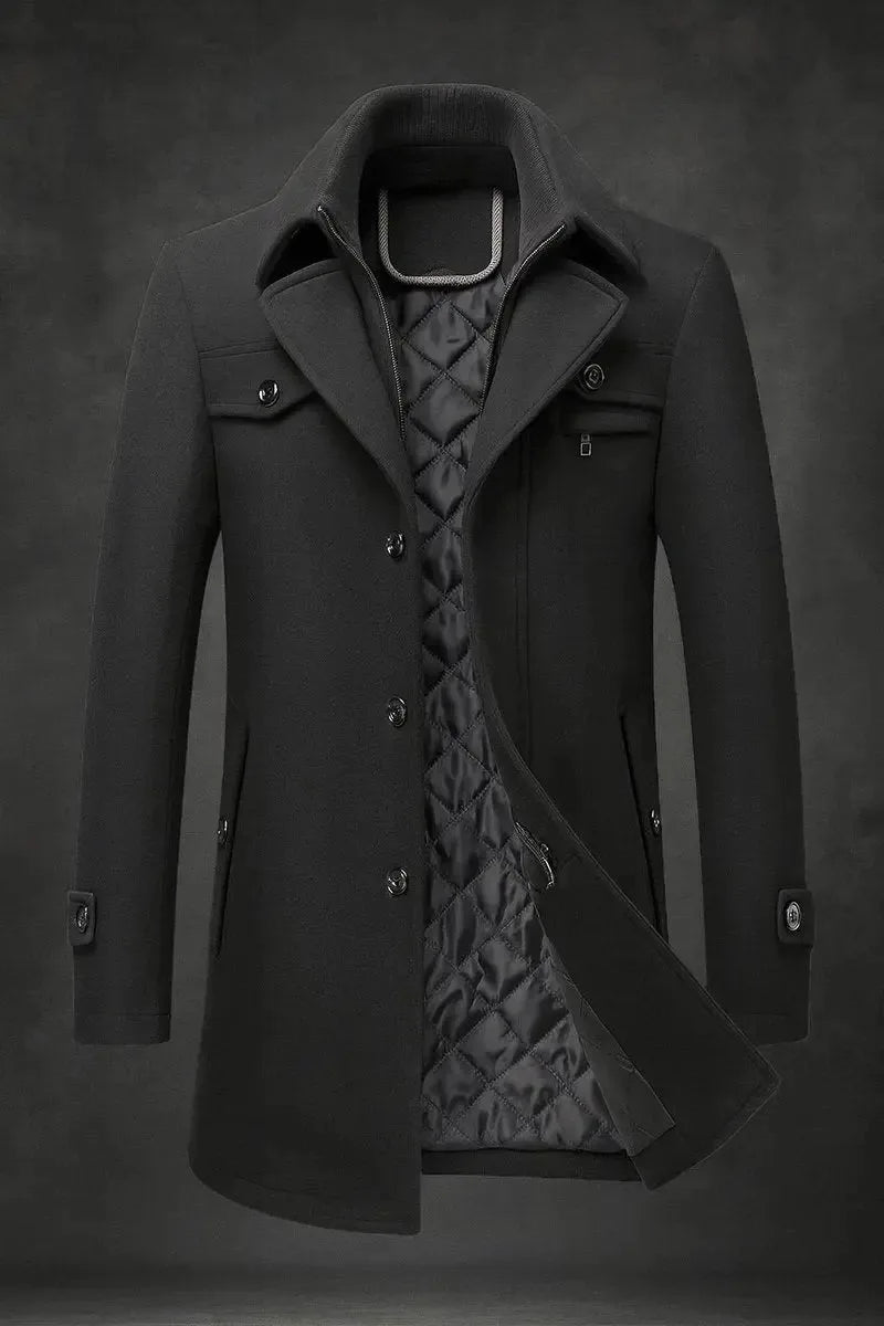 Black wool overcoat with double collar and quilted lining, front view showing flap pocket and buttoned cuffs