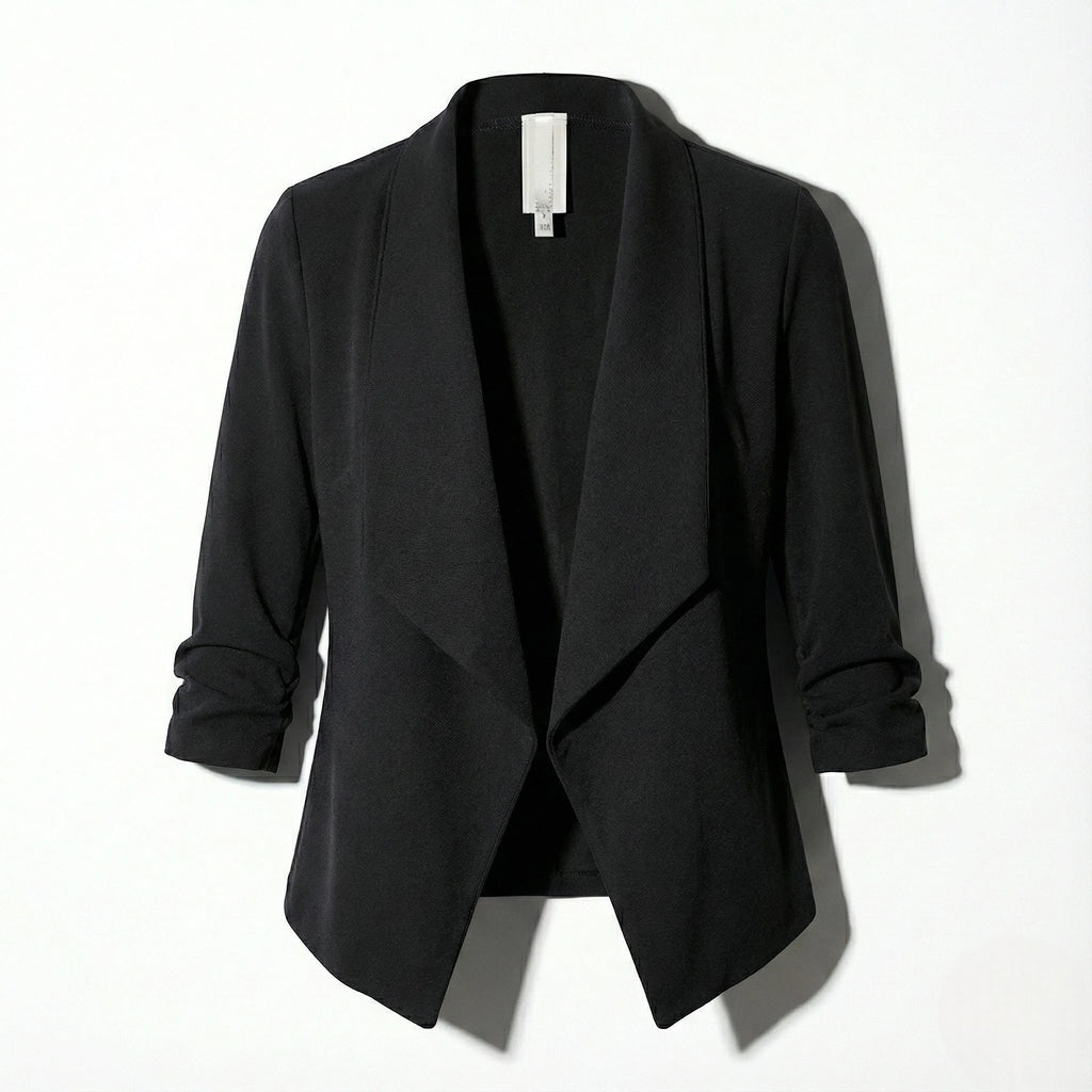 Black open-front blazer laid flat, highlighting the structured collar and clean front edge