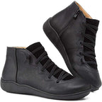 Black ankle boots with crisscross lacing and side zip, shown from front and side angles