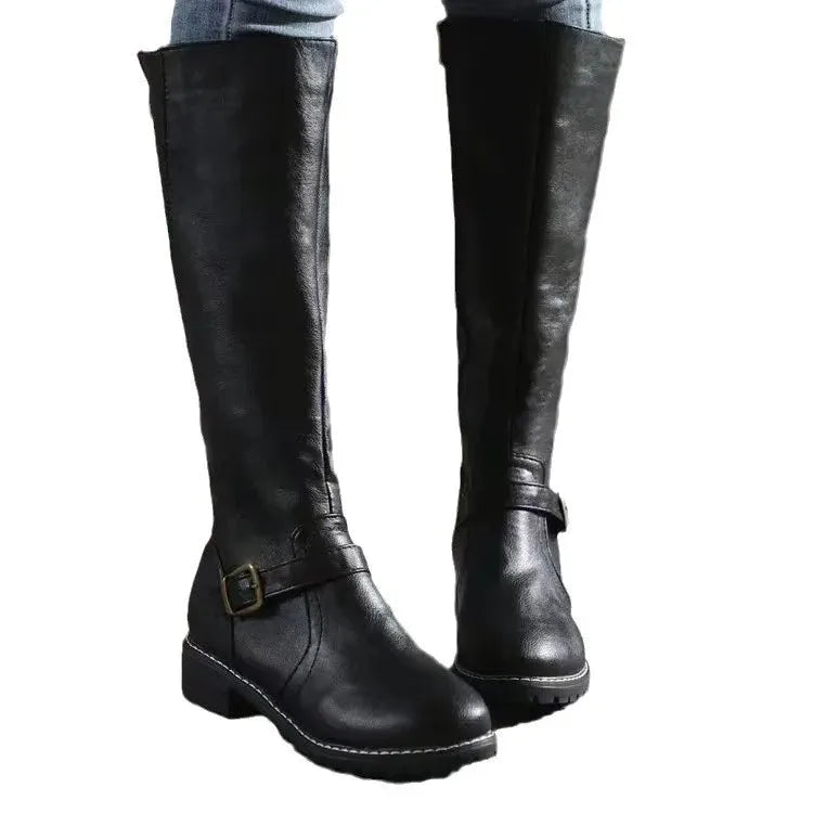 Pair of black knee-high boots on a plain background showing full straight-leg silhouette