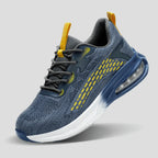 Three-quarter studio view of the complete blue trainer with yellow speckled overlay and white gradient sole