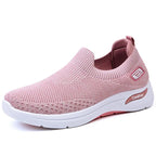 Side angle of pink knit slip-on trainer with white chunky sole and ComFort branded heel detail