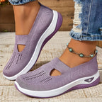 Lilac woven trainers with cut-out upper and two-tone white and purple sole, side angle showing textured knit pattern